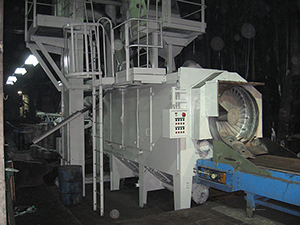 Continuous drum shot blasting machine